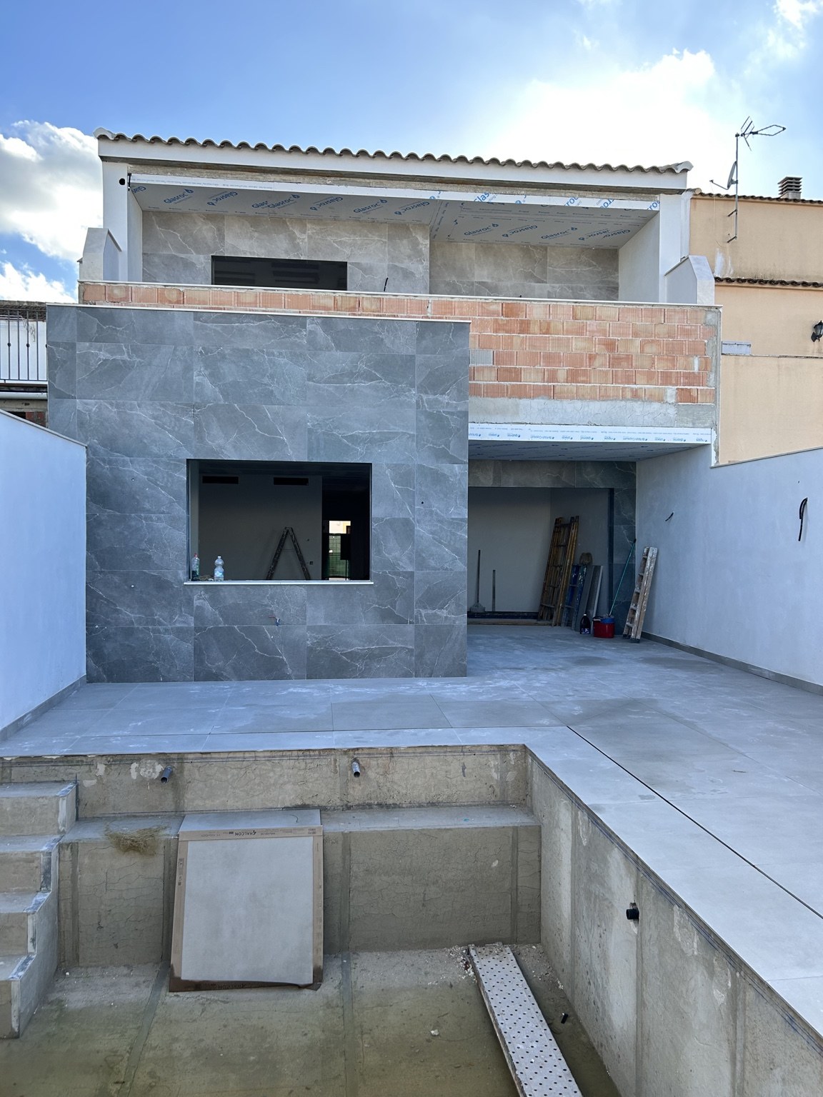 Reforma exterior — fachada y patio. Córdoba.